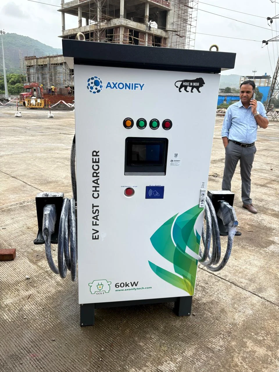 AXONIFY 60 kW charging cabinet photographed at an outdoor industrial site